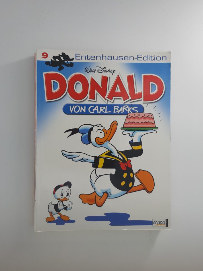 Comic „Donald – Entenhausen-Edition Band 12“ von Carl Barks, Softcover-Ausgabe aus dem Ehapa Verlag, nostalgisches Cover mit Donald Duck in klassischer Pose, neuwertiger Zustand.