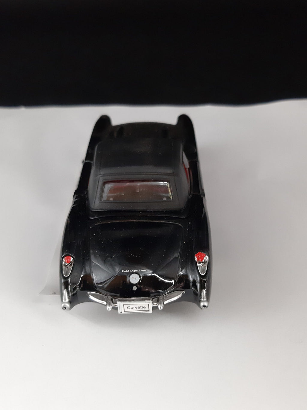 Modellauto Chevrolet 1957 - Corvette Cabrio schwarz geschlossen (aus Metall mit Friktionsmotor) 1:36