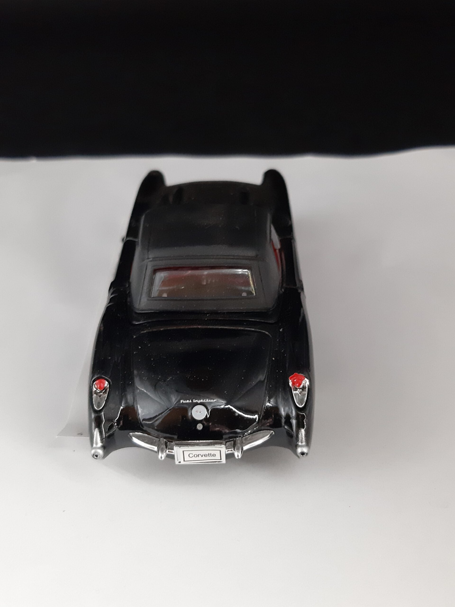 Modellauto Chevrolet 1957 - Corvette Cabrio schwarz geschlossen (aus Metall mit Friktionsmotor) 1:36