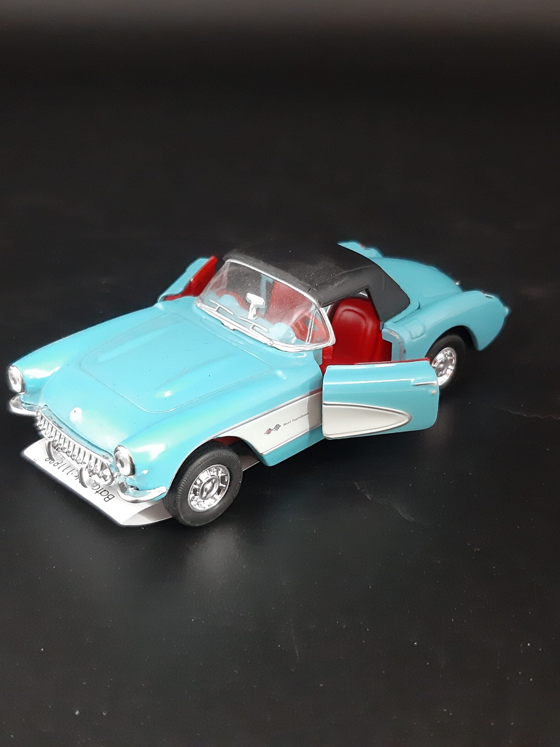 Modellauto Chevrolet 1957 - Corvette Cabrio blau geschlossen (aus Metall mit Friktionsmotor) 1:36