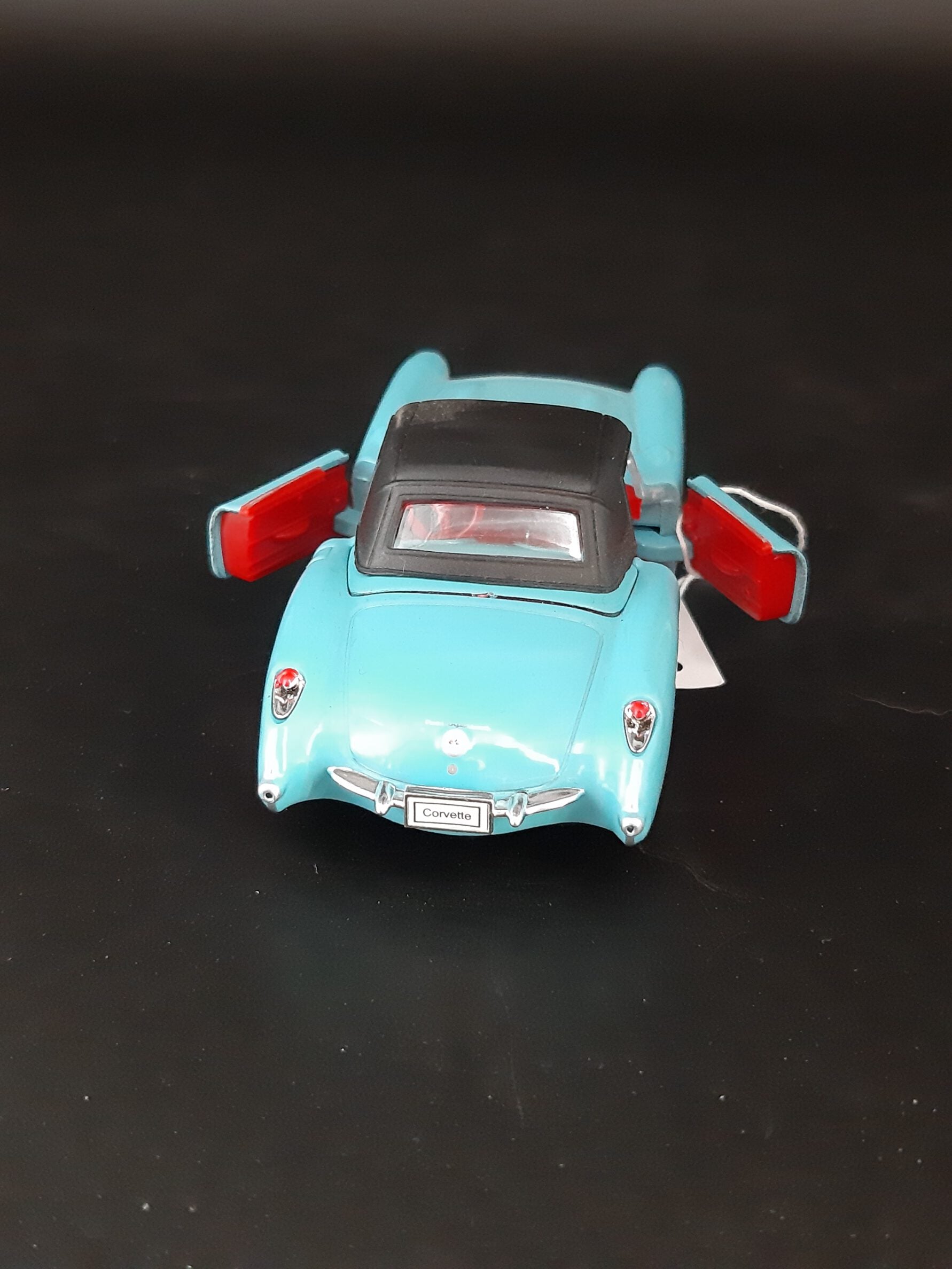 Modellauto Chevrolet 1957 - Corvette Cabrio blau geschlossen (aus Metall mit Friktionsmotor) 1:36