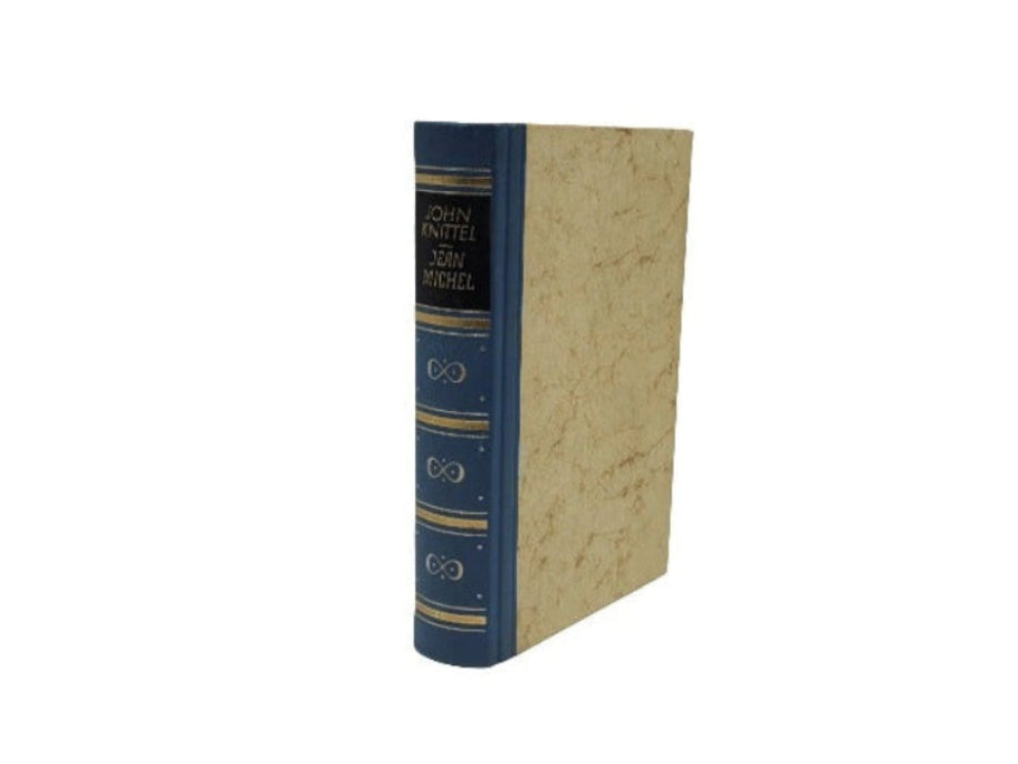 „Hardcover ‚Jean Michel‘ von John Knittel, Bertelsmann 1954, gebrauchter aber gepflegter Zustand.“