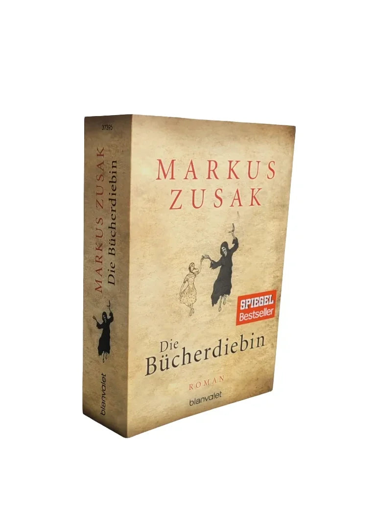 „Die Bücherdiebin – Markus Zusak, Blanvalet Taschenbuch, SPIEGEL Bestseller, EAN 9783442373956, beige Cover mit der Bücherdiebin und dem Tod als Figur.“