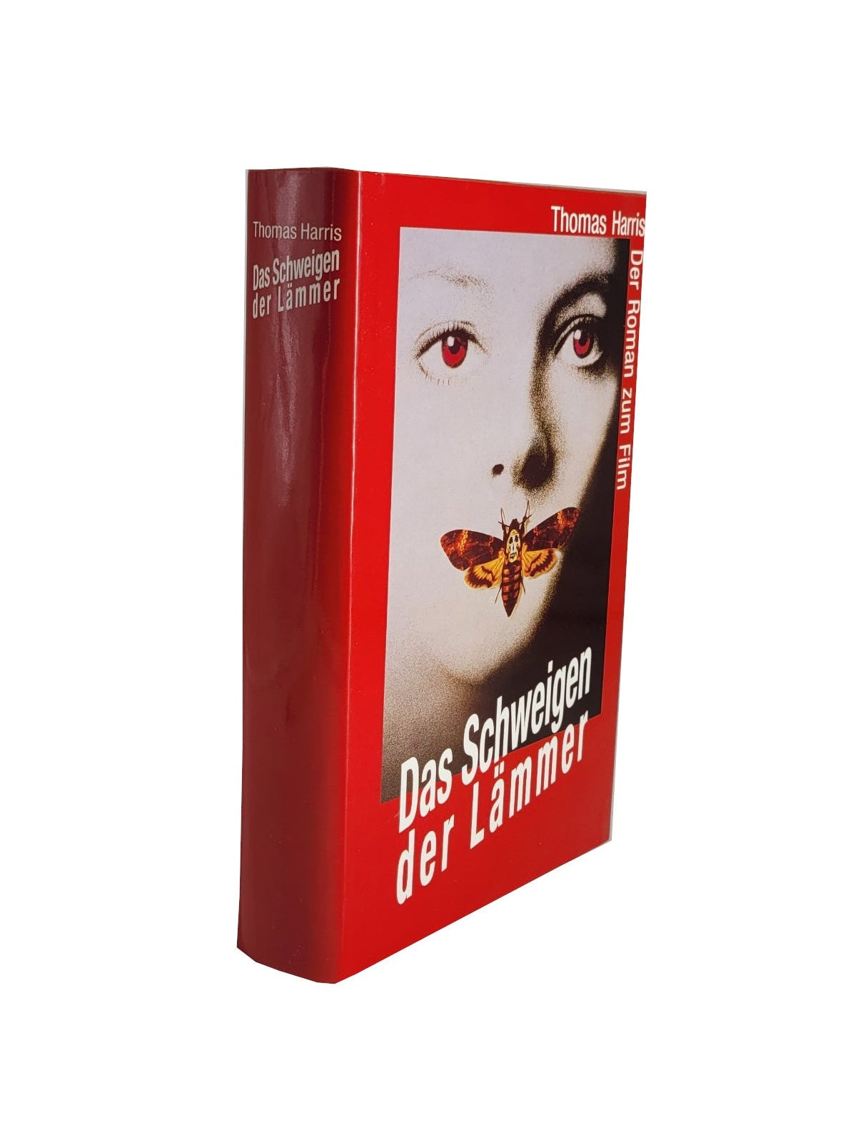 „Buch ‚Das Schweigen der Lämmer‘ von Thomas Harris, Bücherbund‑Ausgabe 1990, Hardcover mit leichten Gebrauchsspuren.“