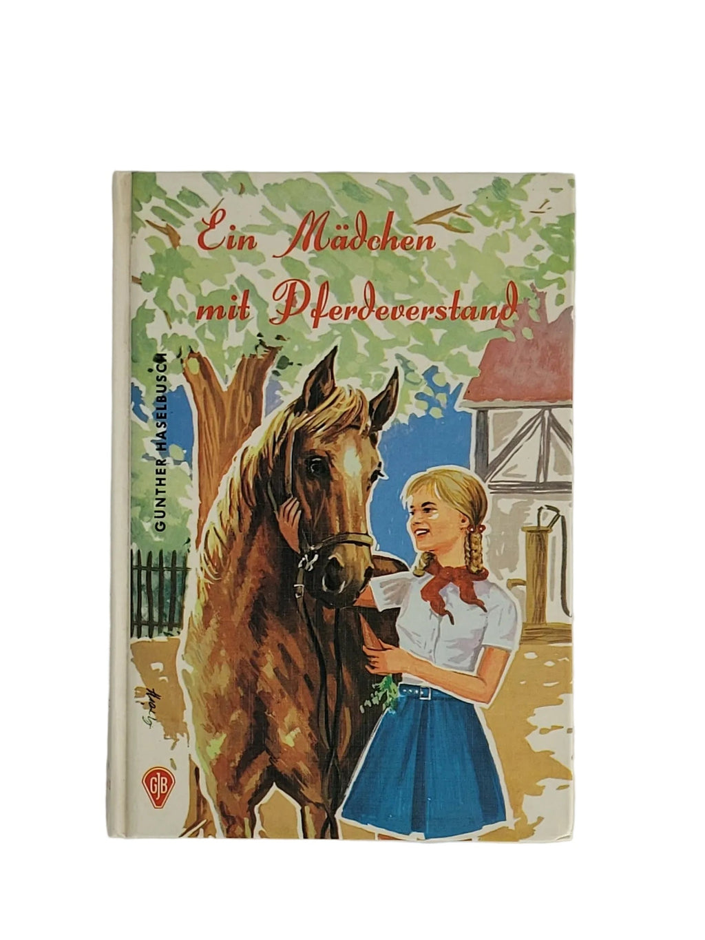 Illustriertes Hardcover-Cover des Göttinger Jugendbuchs "Ein Mädchen mit Pferdeverstand" von Günther Haselbusch mit blondem Mädchen neben einem braunen Trakehner-Pferd.