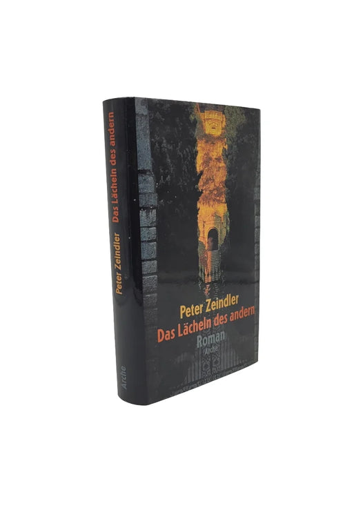 „Hardcover-Roman ‚Das Lächeln des andern‘ von Peter Zeindler, Arche Verlag, dunkles Cover mit Flammenmotiv und Säulen“