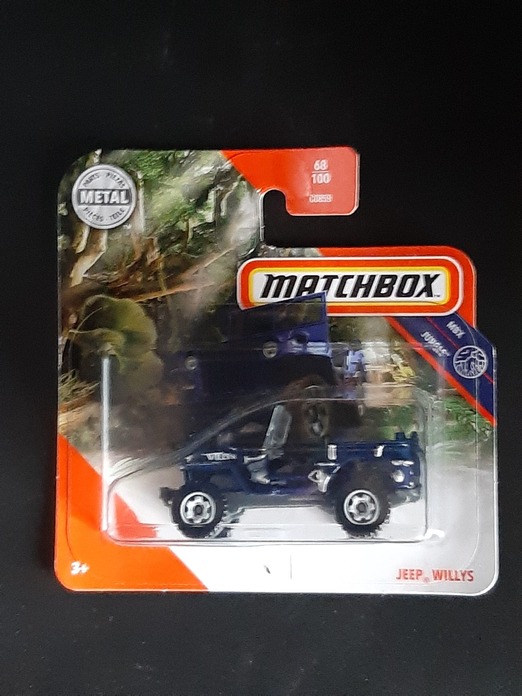 Matchbox Jeep Willys MBX Jungle 68/100, grüner Metall‑Druckguss, ca. 6,5×3×2,5–3,5 cm – neues Sammlermodell in OVP im Maßstab 1:64.