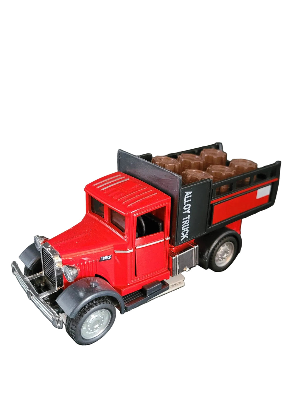 „Roter Classic‑Oldtimer‑Ford‑LKW im Maßstab 1:36, etwa 13 × 5 × 6 cm groß, aus Metall mit Kunststoffteilen und Friktionsmotor. Das Modell zeigt typische Details eines historischen Ford‑Trucks.“