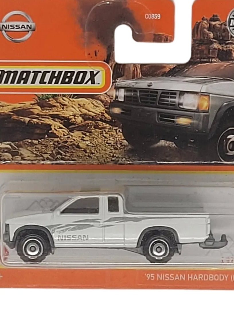 Matchbox Nissan Hardbody D21 17/100, roter Metall‑Druckguss, ca. 7,5×3×2,5–3,5 cm – neues 1:64‑Sammlermodell in OVP.