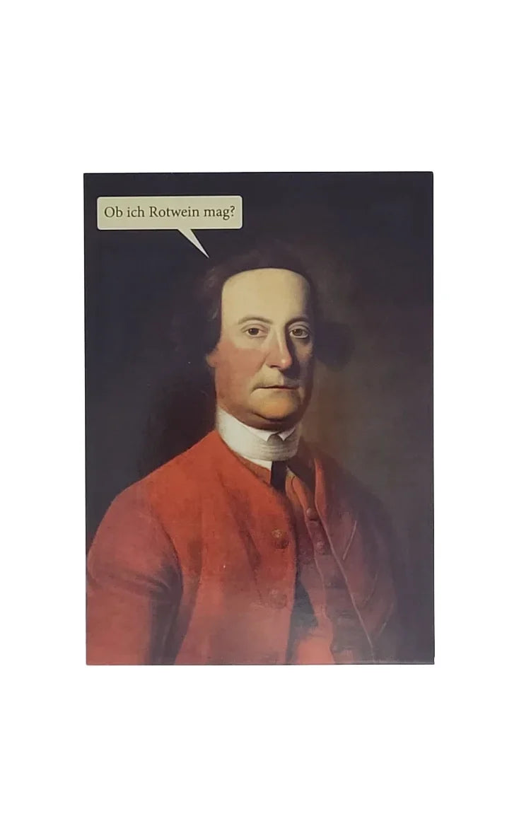 „Postkarte mit klassischem Porträt eines Mannes in rotem Mantel und weißem Halstuch. In einer Sprechblase steht: ‚Ob ich Rotwein mag?‘ – ein humorvoller Kontrast zwischen historischer Darstellung und modernem Witz.“