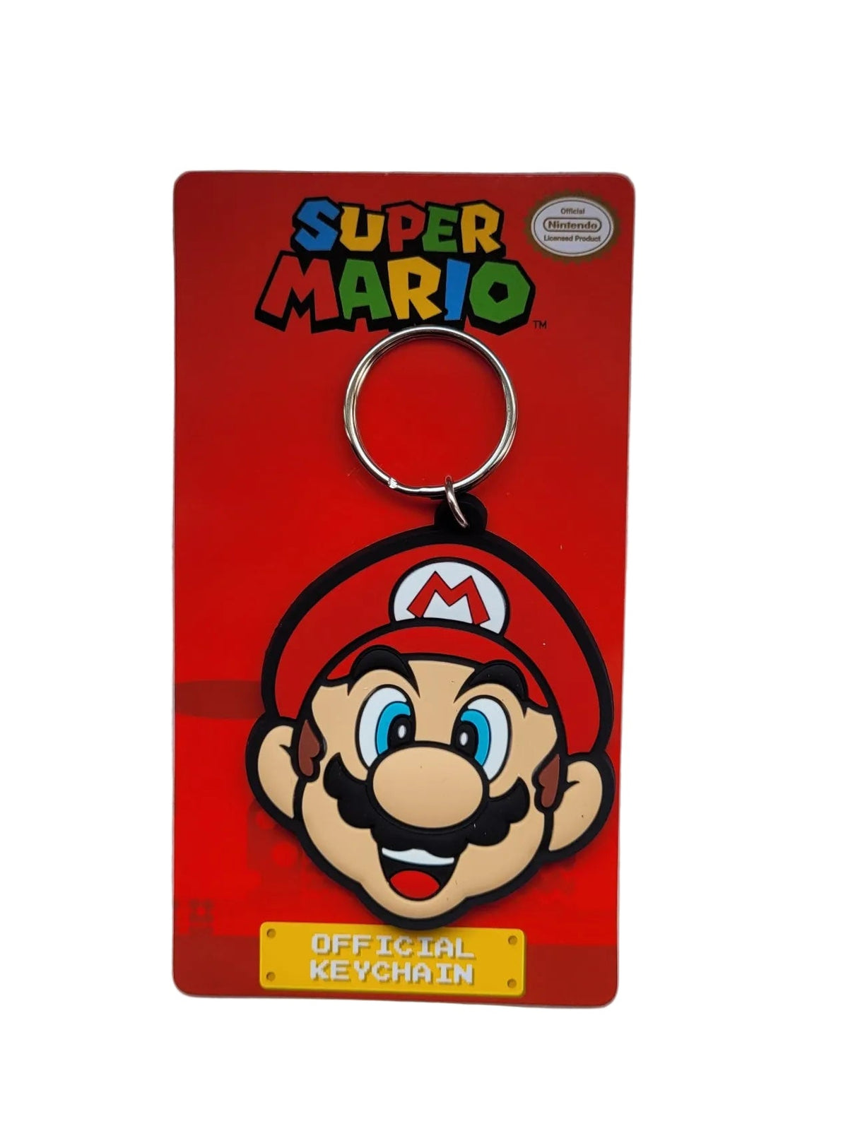 „Runder Super‑Mario‑Schlüsselanhänger aus strapazierfähigem PVC, Ø 5 cm, 12 g, mit Metall‑Schlüsselring, Nintendo‑Porträtmotiv, neu und originalverpackt.“  