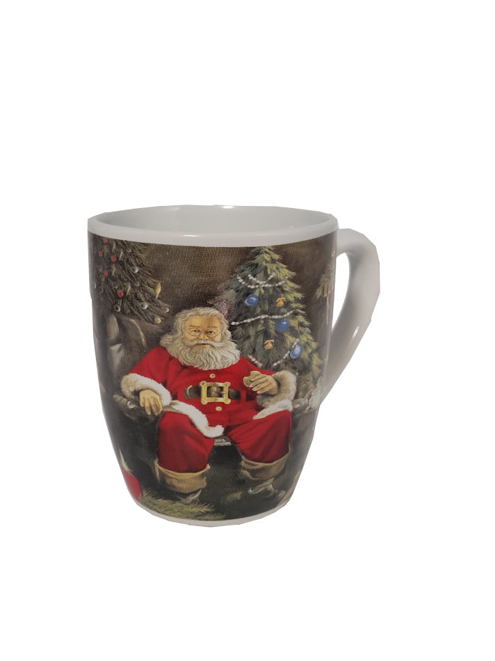 Tasse Weihnachtstasse - Der Weihnachtsmann sitzt in seinem Sessel
