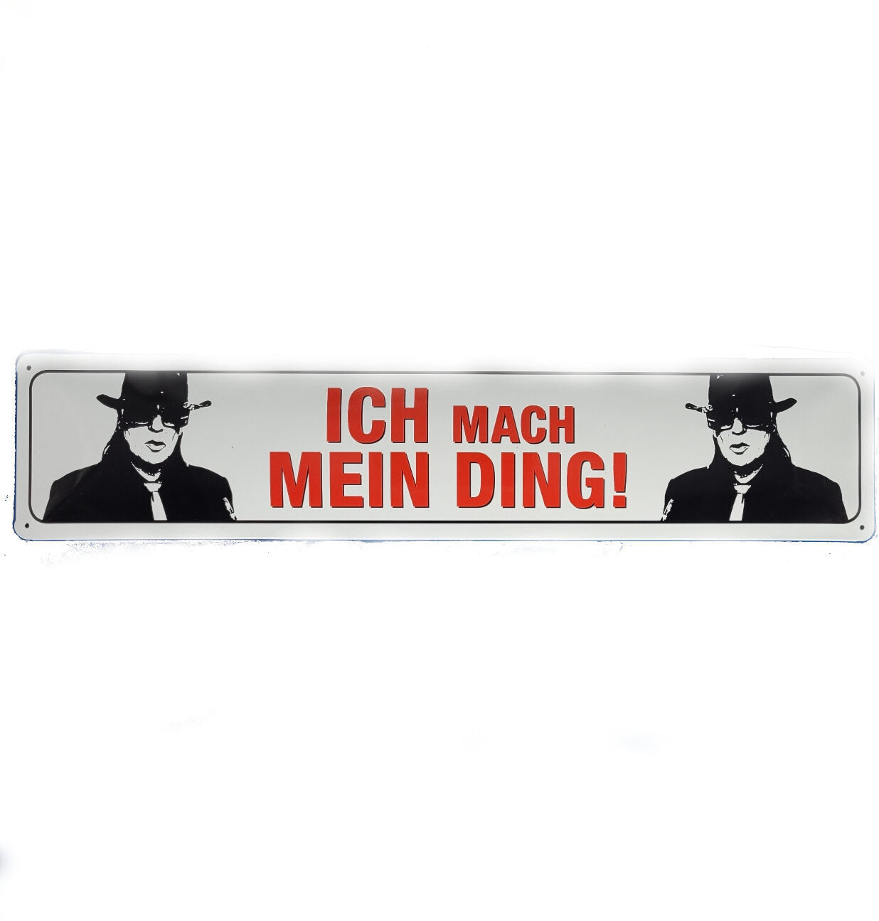 „Rechteckiges Blechschild im Stil eines Straßenschilds mit Udo‑Lindenberg‑Motiv und dem Schriftzug ‚Ich mach mein Ding‘, 46 × 10 cm groß, aus geprägtem Metall im Retro‑Design.“