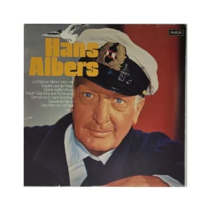„Albumcover von Hans Albers – AMIGA 851265 (1988): Porträt in Kapitänsuniform mit weißer Mütze, gelber Schriftzug und Liedtitel wie ‚La Paloma‘ und ‚Das Herz von St. Pauli‘. Rückseite zeigt Meereswellen und Trackliste.“