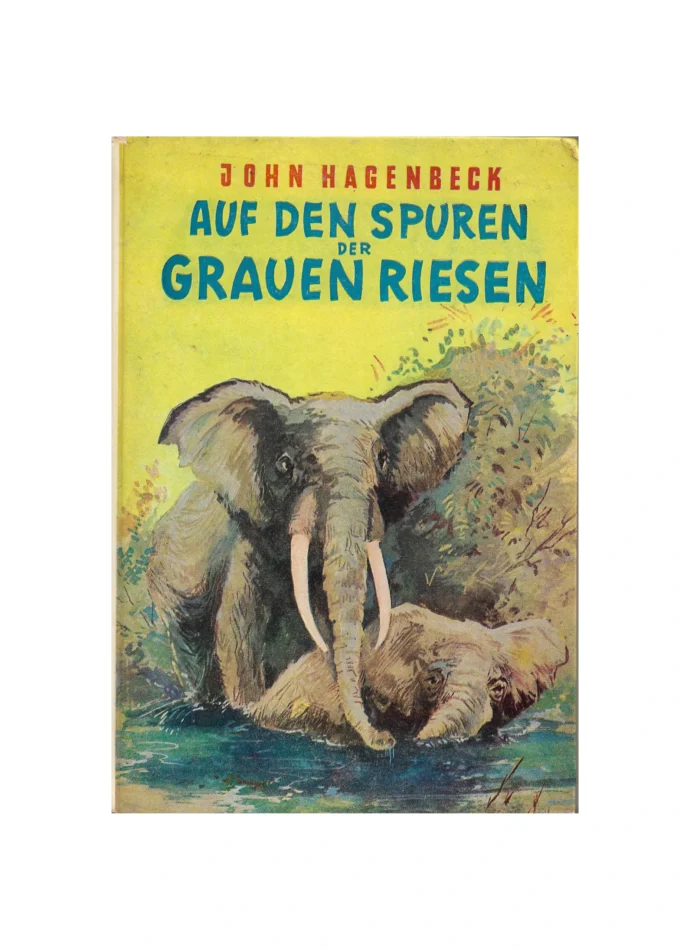 „Buchcover von ‚Auf den Spuren der grauen Riesen‘ von John Hagenbeck. Illustration zeigt zwei Elefanten in einer Wasserlandschaft, einer mit großen Stoßzähnen im Vordergrund. Hintergrund in Gelb- und Grüntönen, Titel in weißer Schrift.“